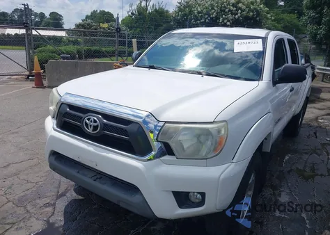 2015 Toyota Tacoma Base V6 z USA, uszkodzony, nr VIN 3TMLU4EN5FM169482